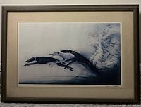 Front view of framed print showing image and mat