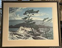 Full front view of framed print depicting white pines landscape scene with clouds, lakes and mountains.