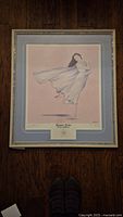 Full image of framed artwork showing the ballerina figure and the framing detail.