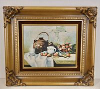 Front view of the oil painting showing the still life scene and ornate gilded frame