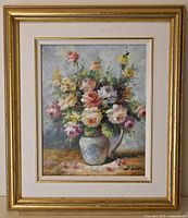 Front view of the framed floral oil painting showing the bouquet in a vase and artist signature.