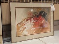 Full view of framed painting by Paul Pletka resting on a table with a price tag 222 and measurement 19x26 noted.