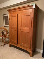 Angled front view showing overall cabinet and setting