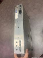 Side and back view of the Marti CR 10 RPU receiver showing power input, antenna connection, and labeling details.