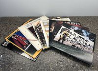 Top view of 8 assorted Murray McLauchlan vinyl records fanned out showing front album covers including Whispering Rain