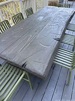Top view of tabletop showing distressed surface and wood grain