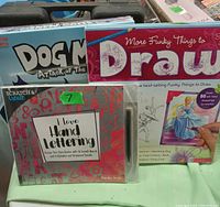 Four items including art books and craft kits as described, stacked and arranged to show titles and covers.