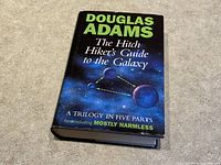 Front cover of the book showing title, author, and graphic space design indicating it is a hardcover with dust jacket.