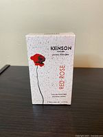 Front of the perfume box showing Kenson Red Rose branding with red rose graphic.