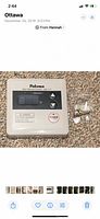 Paloma branded digital remote control unit with power button and arrows for temperature adjustment, includes mounting screws