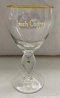 Single clear stemware glass with gold rim, 'Irish Coffee' text, and shamrock on stem detail.
