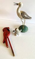 Set of three decorative birds: wooden shore bird, wood cardinal, chalkware eagle