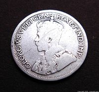 Obverse side of the 1913 Canada 10 Cents coin featuring King George V profile and inscriptions.