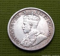 Obverse view of 1918 Canada 10 cent coin featuring King George V portrait and inscription.