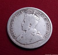 Obverse of the 1916 Canadian 10 cents coin showing King George V profile and text "GEORGIVS V DEI GRA REX ET IND IMP."