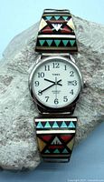 Front view of Timex watch with multi-color Zuni inlaid stone sterling silver watchband tips.