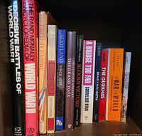 Books arranged vertically on a shelf showing titles related to World War I, British Empire, Scotland history, and key military battles.