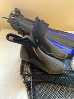 O'Neill wetsuit booties size 11 with zipper on side and ribbed texture, black and grey color