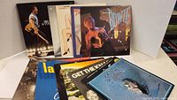 Photo showing Bruce Springsteen & The E Street Band album, The Cars Candy, David Bowie album, Pat Benatar album, and Eagles Greatest Hits albums