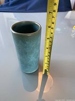 Side view of the pottery vase/tumbler with measuring tape showing height as approximately 6.5 inches.