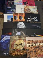 Overview of 17 vinyl records on sofa