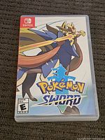 Front of Pokémon Sword Nintendo Switch game case showing main artwork with Zacian character.