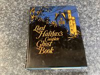Front cover of 'Lord Halifax's Complete Ghost Book' hardcover book showing title and illustrative artwork.