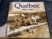 Front cover of the hardcover book titled 'Quebec 1850-1950' with rural Quebec imagery.