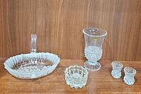 Photo showing Mikasa Winter Dreams basket, vintage lead crystal vase, candleholder and pineapple toothpick holders arranged together