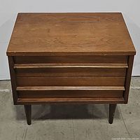 Front view of nightstand with drawers closed