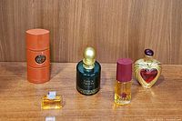 Overview of all five bottles displayed on wood background