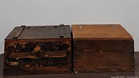 Photo of two wooden crates side by side showing general appearance and condition