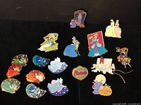 Overview of all 17 pins arranged on black background showing Cinderella scenes and Fairy Godmother variants.