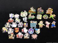 31 enamel Disney trading pins laid flat