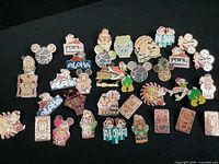 Overview of 30+ Disney trading pins featuring Polynesian Resort and tropical themes including characters like Mickey Mouse, Minnie, Donald, Daisy, Chip and Dale, and Pluto. Includes Aloha text, tiki masks, and pineapple designs.