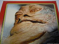 Close-up of trading card with image of Jabba the Hutt
