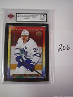 Front image of the graded card showing Auston Matthews in Toronto Maple Leafs white jersey, with KSA 9.5 grading label.