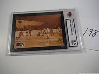 Front of the hockey card showing Bill Barilko scoring a goal in sepia tone, with Pro Set and NHL logos, graded 9.5 NGM.