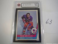 Front of 1977-78 OPC WHA Frank Mahovlich graded hockey card showing player in Birmingham Bulls uniform.