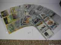 Partial collection of Star Wars Empire Strikes Back trading cards fanned out with white background and card number 123 displayed.