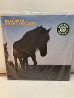 Front cover of Babe Ruth Amar Caballero LP in sealed shrink wrap with horse artwork