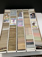 Full box with five rows of loose sports cards
