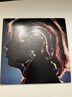 Front cover of the Rolling Stones Hot Rocks double LP showing artistic silhouette profiles of band members.