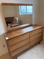 Front view of dresser with attached mirror