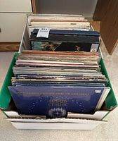 Box of upright LP records showing assorted covers with Jesus Christ Superstar in front