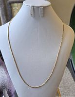 Full view of 21-inch box chain necklace displayed on bust