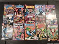 Overall lot of 15 DC Comics including Demon, Green Arrow, Psyba-Rats, Challengers of the Unknown, The Rebels, Legend of Superman, Deadman, and more