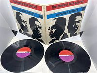 Front cover and two black vinyl LPs spread out with visible Atlantic label.