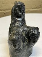 Front view of sculpture showing full torso and head