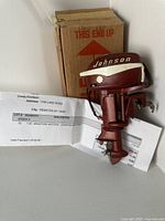 Front view of model with box and bill of sale